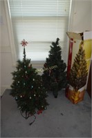 2 Pre-lit Christmas trees- approximately 4ft