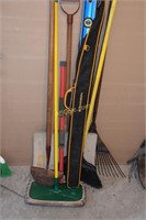 Lot of tools to include 4ft level, shovel, broom,