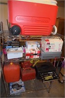 Cooler with wheels, light bulbs, tool box, and