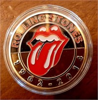 Rolling Stones medallion.