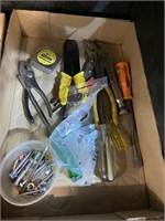 screwdrivers wire stripping pliers tape measure