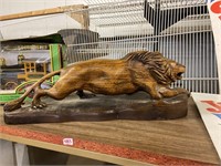 hand carved wood lion wolverine and covers of GR
