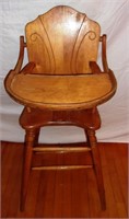 Wooden high chair.