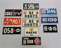 Group of Small Foreign Metal License Plates