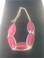 Gold tone and red stone necklace