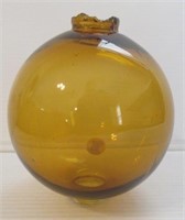 Vintage 4-1/2" round amber glass lightning rod