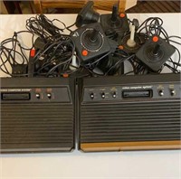 2 Atari game consoles and accessories. Not