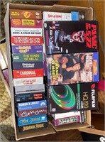 Box of VHS tapes. Some science fiction