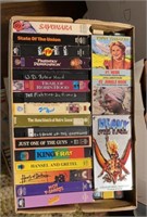Box of VHS tapes as shown