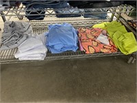 Bottom Shelf Of Clothes