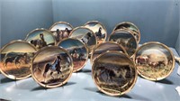 12 collectable horse plates with stands