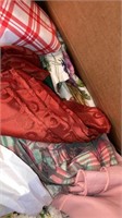 Large box of tablecloths linens