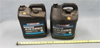 2-2 Gal. Cans of 10W-30 Oil- 1 is open