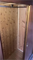Wooden cedar-lined closet  40” w x 23” deep