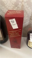 Sealed Johnnie Walker red label blended scotch