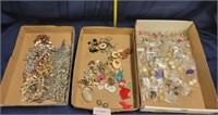 3 FLAT BOXES OF COSTUME JEWELRY