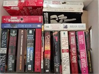 Box of at least 30 paperback novels
