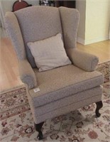 A Queen Anne Style Upholstered Wing Chair