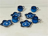 4 small pottery cups & saucers