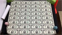 Uncut sheet of 32 $2 bills in original roll