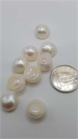 9 fresh water pearls. Flat bottom