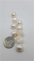 9 freshwater pearls. Flat bottom