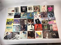 Assorted 45 Records With Sleeves