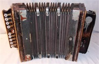 Vintage accordion/ squeeze box.