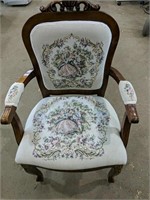 Vintage chair with padded seat, back, and