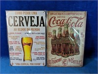 Two tin wall signs 8" x 12"
