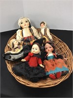 Five Vintage Dolls in a Basket