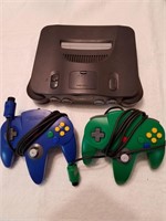 Nintendo 64 w/2 controllers and 6 games.