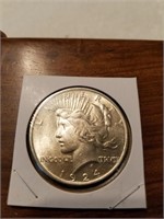 1924 Silver peace dollar. Au beautiful luster.