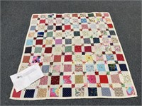 Hand quilted lap quilt by Betty Ooley