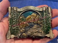 1983 God's Country belt buckle