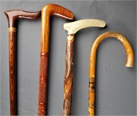 Lot of 4 Vintage Hand Carved Wood Canes/ Sticks