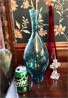 TWO BOTTLES (RED,GREEN)  AND A CRYSTAL CROSS