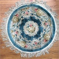 Two Round Oriental Fringed Area Rugs