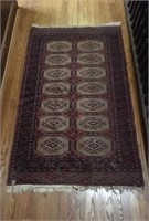 Brownish Rug with 14  Ovals 37.5" x 62"
