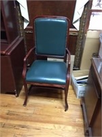 Two Rolling Green Arm Chairs - upstairs office
