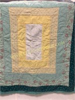 Pretty double sided baby quilt