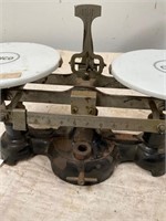 Vintage cast iron scale with porcelain plates