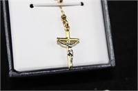 CROSS NECKLACE ON GOLD TONED NECKLACE