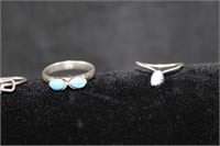 LOT OF THREE SOUTHEWEST SILVER AND TURQ. RINGS