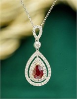 0.7ct pigeon blood ruby pendant in 18k gold