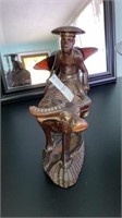 Carved wooden Indonesian statue 9” long