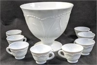 Milk glass punch bowl with eight glasses and