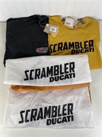 Two scrambler Ducati T-shirts and bags