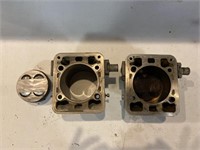 Two Ducati cylinders and pistons casting number on