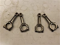 Four used Ducati connecting rods